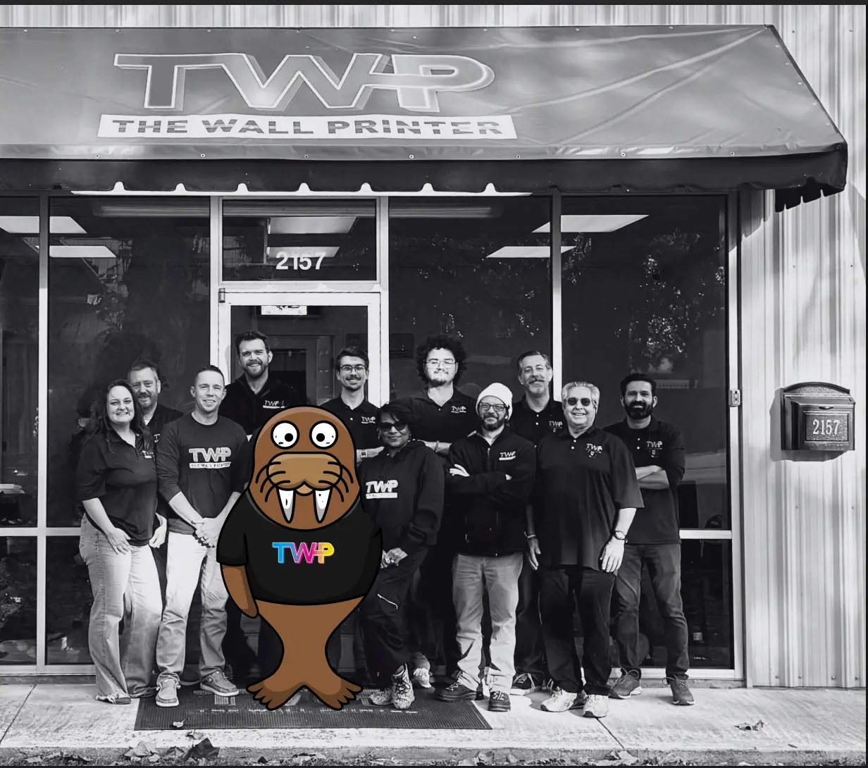 The Wall Printer team outside their Wilmington, NC headquarters