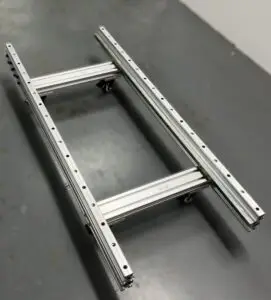 TWP 15-foot aluminum track system for the WP-UV-PRO wall printer — precision-engineered with machined gear rack for full-wall printing in a single setup