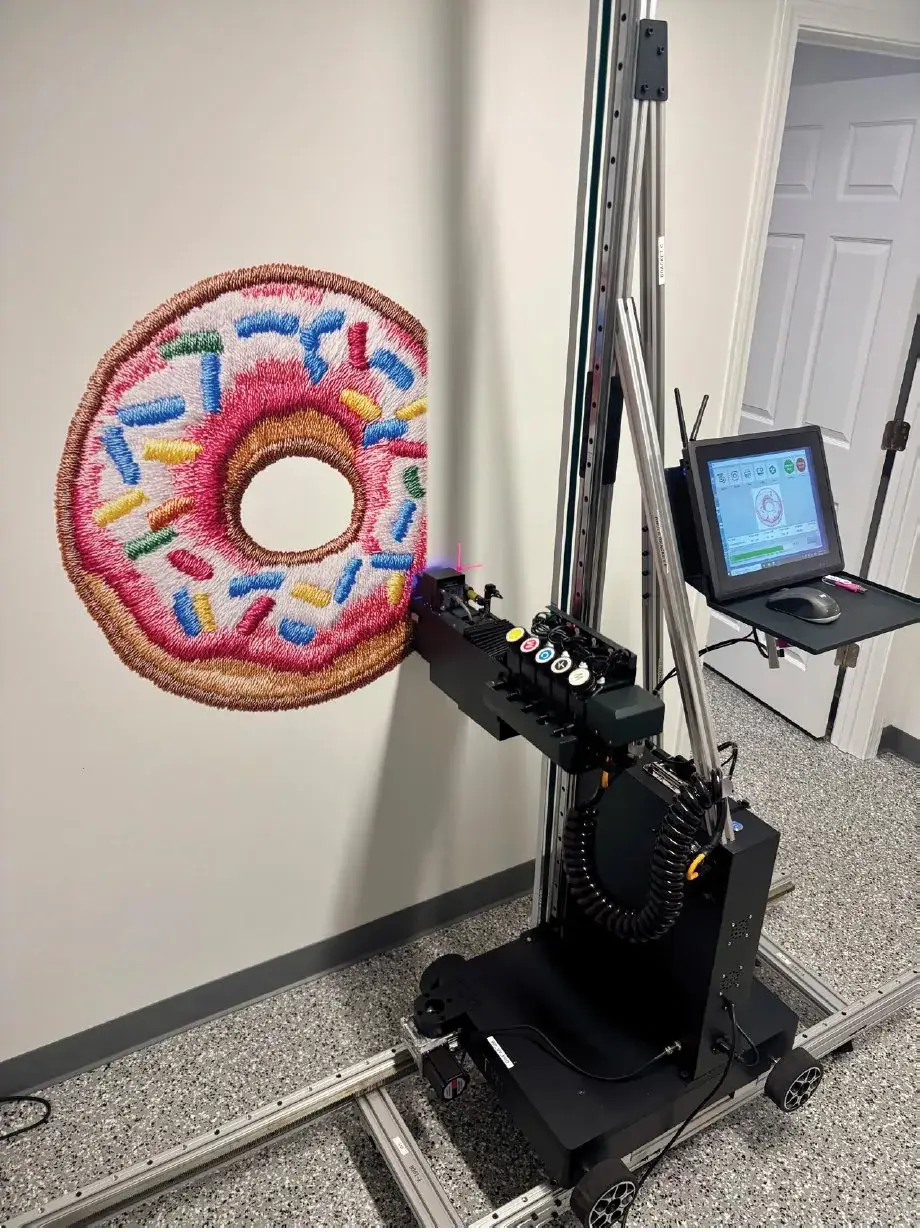 Embroidered-look donut graphic printed directly on a wall