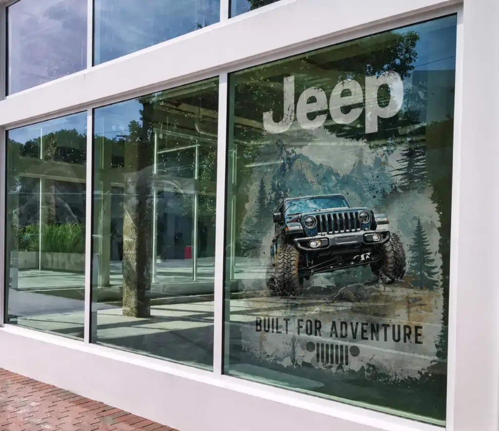 Custom commercial window graphics printed directly onto glass using UV printing technology for retail branding and business advertising.