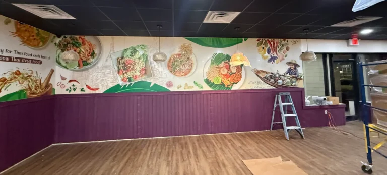 Custom restaurant wall graphics printed directly onto the wall using a UV wall printer to transform a commercial dining space.